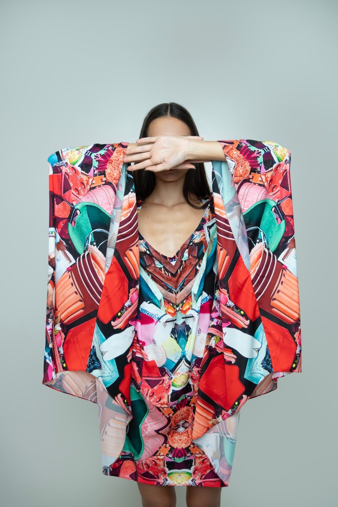 a girl in a red caftan dress with closed face